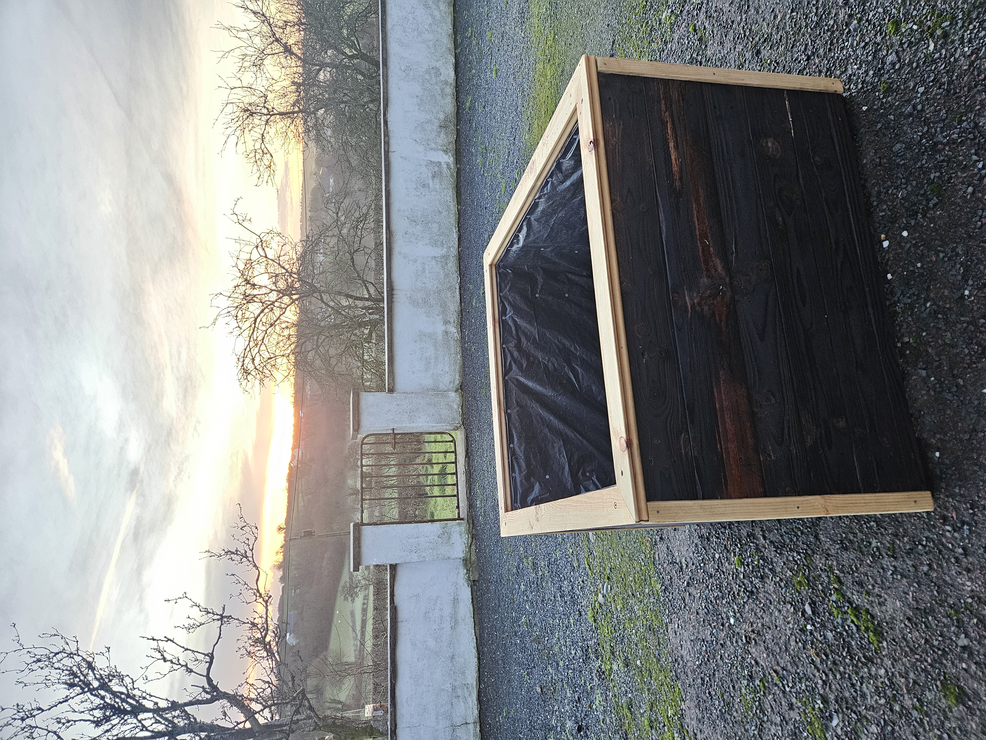 Medium raised garden bed made from reclaimed wood with shou sugi ban finish